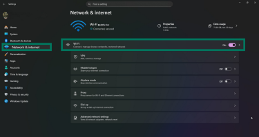 Network & Internet settings on Windows showing Wi-Fi option highlighted.